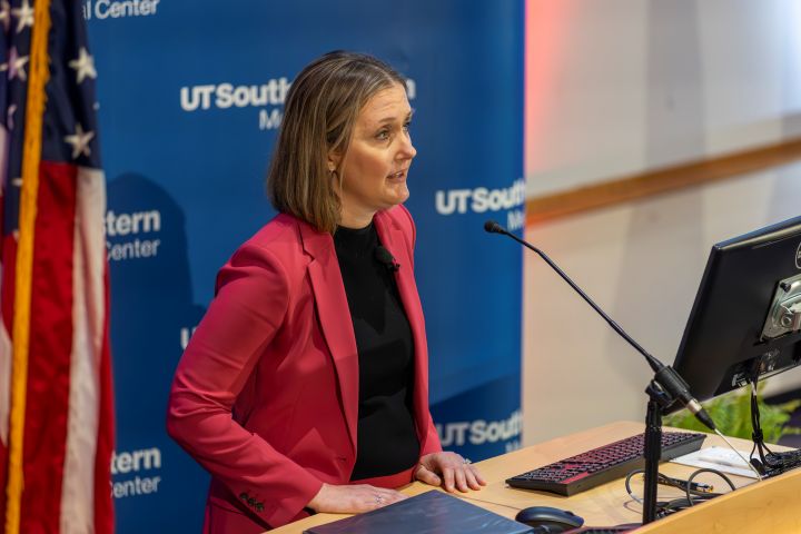 Veteran woman speaking at podium