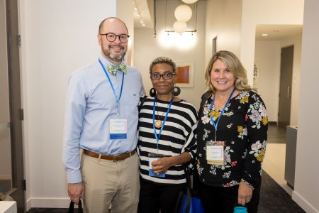 3 members of North Texas Health coalition - from left: tall white man with glasses and bowtie, black woman with striped shirt and glasses, blond woman with floral shirt