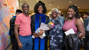 Aarin Jones (in gown) and her family are all smiles after the ceremony.