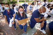 Rally organizers said physicians have a responsibility to acknowledge racial inequalities that affect black patients in all areas of their lives.