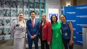 Organizers of the event and UTSW executive leaders pause for a group photo at the display unveiling.