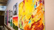 Colorful works of art in all shapes, sizes, and media graced the walls of the Faculty Club during the reception.