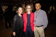 From left: Dr. Catherine Spong, Professor and Chair of the Department of Obstetrics and Gynecology, Rising Star Award recipient Dr. Emily Adhikari, and her husband, Dr. Soumya Adhikari