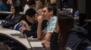 Attendees of the AI Symposium take part in breakout sessions to address the opportunities and risks of using artificial intelligence in health care.