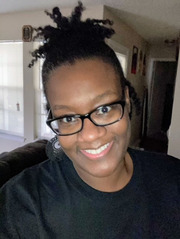 Keysha Hale, Enrollment Services, poses in her home before heading out for an afternoon walk and some jump rope exercises.