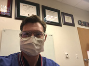 Dr. Joel Wells, Assistant Professor of Orthopedic Surgery, poses with his personal protective equipment on – a vital way of staying healthy during a pandemic.
