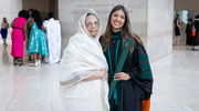 Maishara Muquith, M.D. (right), celebrates the special milestone with her grandmother.