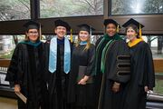 Posing for a celebratory photo (from left) are Drs. Beth Deschenes and Jason Zafereo, Associate Professors in the School of Health Professions; Prosthetics and Orthotics Program Director Leslie Gray; Dr. Temple Howell-Stampley, Chair of the Department of Physician Assistant Studies; and Leigh McAtee, Student Events Coordinator.