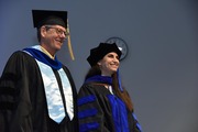 Dr. Dean P. Smith (left), Professor of Pharmacology and Neuroscience, and Dr. Elizabeth Anne Scheuermann, who earned her doctorate in neuroscience