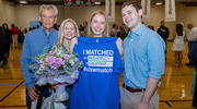 Beside her excited family, Sofia Shirley shows off her pediatrics match to Columbia.