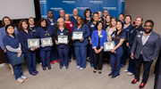 Health System employees gather for a group photo.