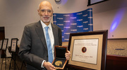 Dr. Vazquez with his Watson Award medal and certificate.