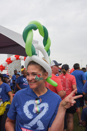 Balloon hats and peace signs for fun.