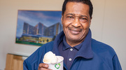 Facilities Management’s Chester Smith poses with his sweet treat.