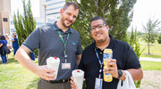 Clay Akin and Alberto Juarbe Nieves show off sweet treats and drinks.