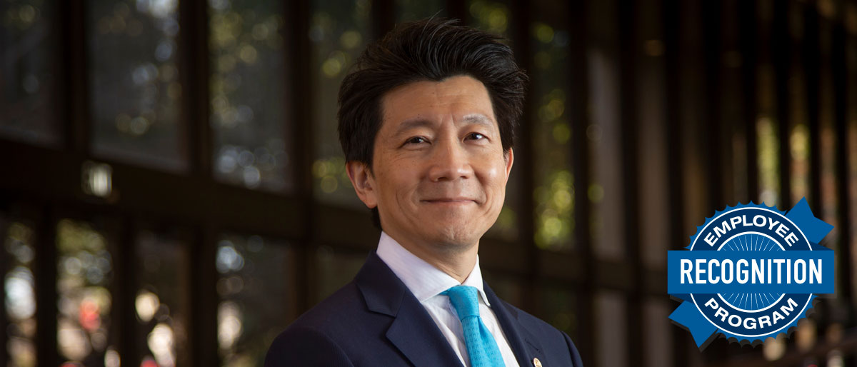 Man with black hair in dark suit