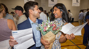 The match news brings joy and big smiles from Praneeth Kalva (left) and Tanooha Veeramachaneni.