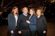 From left: Patient and Family Recognition Award recipient Dr. Nisa Kubiliun, pictured with her supportive family