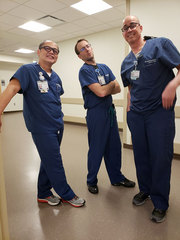 Cool poses with the men of the Venous Access team. 