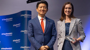 W. P. Andrew Lee, M.D., Executive Vice President for Academic Affairs, Provost, and Dean of UTSW Medical School, honors Elaine Duryea, M.D., with the Rising Star Award.