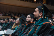 Medical School students listen attentively during commencement