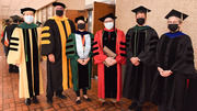 UT Southwestern and School of Health Professions leaders come together after the commencement ceremony.