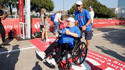 Two UT Southwestern walkers cross the finish line.