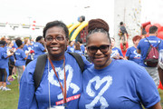 Two UTSW employees smile for the camera.