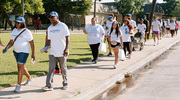 UT Southwestern employees, family, and friends proudly begin the walk in South Dallas in honor of Juneteenth.