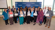 Business Affairs leaders join honorees and other celebrants for a group photo.