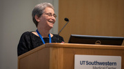 Joan Conaway, Ph.D., Vice Provost and Dean of Basic Research, opens the event by welcoming the UT Southwestern research community to another year’s New Faculty Research Forum at which 14 Assistant Professors presented their research.