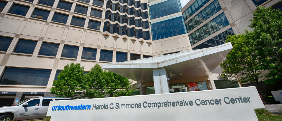 Large building with sign that says Simmons Cancer Center