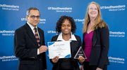 The Cardiology team was recognized as the Best Research Billing Compliance Team this year. Senior Research Associate Elviche Lenou, center, and Supervisor of Clinical Research Amy Browning, right, represented their group at the CRP awards ceremony and received the award from Dr. Pappu.