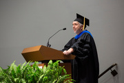 Dr. Luke Rice, Chair of the Molecular Biophysics Graduate Program, announces graduates for their hooding.