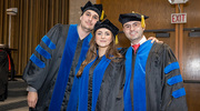 From left, Daniel Schmitz, Ph.D., Lauretta El Hayek, Ph.D., M.S., and Carlos Pinzón Arteaga, Ph.D., D.V.M., M.S., enjoy the memories of the day as new graduates.