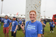 Lauren Smith poses near the rock wall.