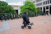 Dr. Tiana Raphel refused to let an injury ruin her big day and relied on a knee walker scooter to help keep her in line with her classmates. Dr. Raphel graduated with Distinction in Medical Education.