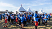 A sea of blue T-shirts is spotted at the base of Reunion Tower!