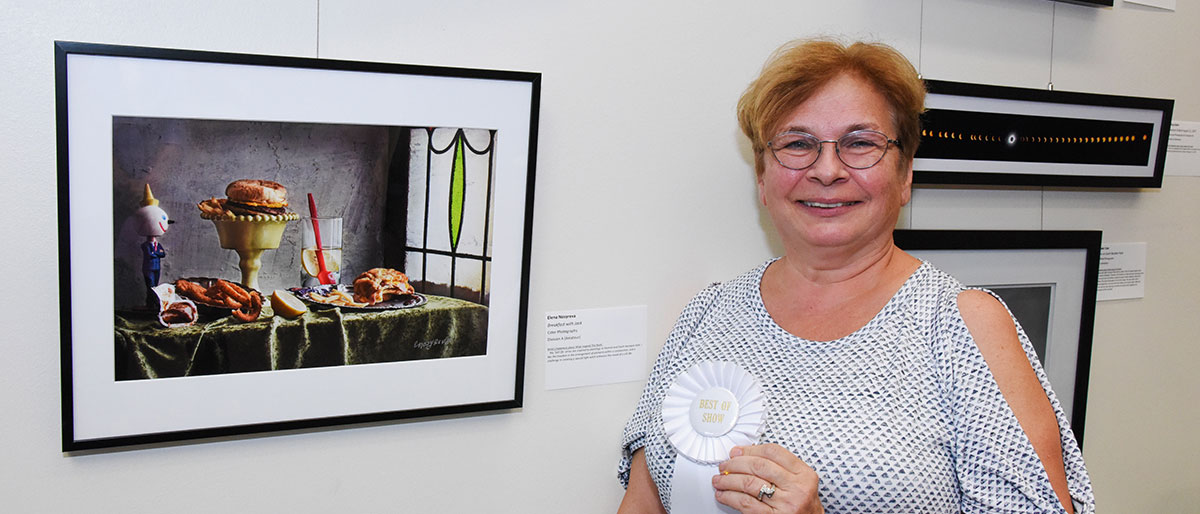 Dr. Nosyreva’s with her art piece titled Breakfast with Jack that won Best in Show