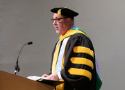 Dr. Jon Williamson, Dean, School of Health Professions, serves as the presiding officer.