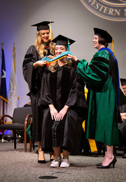 From left: Faculty Associate Dr. Egle Bauzaite , Dr. Emily Frisby, doctor of physical therapy, and Assistant Professor Dr. Tara Dickson