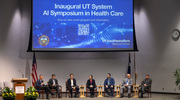 Members of the Industry and Academic Partnership panel discuss how their respective organizations use AI and cloud computing to transform health care and life science research. From left: Russell Poole, M.B.A, Vice President of Information Resources and Chief Information Officer at UT Southwestern; Dr. Peterson; David C. Rhew, M.D., Global Chief Medical Officer and VP of Healthcare at Microsoft; Christine Tsien Silvers, M.D., Ph.D., Healthcare Executive Advisor at Amazon Web Services; Alexander “Sasha” Sicular, Executive Lead of Healthcare and Life Sciences at Google Public Sector; Amar Yousif, M.B.A., Vice President and CIO at UTHealth Houston; and Tyler Rorabaugh, Distinguished Researcher at Palo Alto Networks.