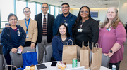 Clinical Research Professionals gather after the event for a group photo, enjoying the camaraderie of the day.