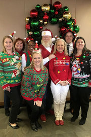 Victoria England - The Office of Nurse Excellence (O.N.E.) helped make this rainy day so festive that Santa showed up.