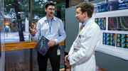 UTSW medical student Angelo Scanio, left, presents his research on the use of AI in diagnosis of osteoporosis to Naim Maalouf, M.D., Director of the Charles and Jane Pak Center of Mineral Metabolism and Clinical Research at UT Southwestern.