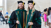 Standing proud for a photo are Stanton Heydinger, M.D., and class co-President Lilly Carter, M.D.