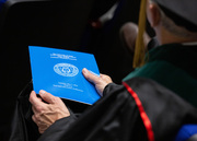 The 2019 Hooding Ceremony program is a graduation memento.