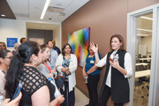 Art curator Courtney Crothers leads a tour of the building's artwork.