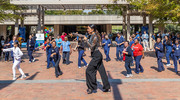 Salsa and bachata lessons bring people to the dance plaza.