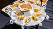 Delicious bites like shrimp ceviche are served as a highlight during the reception.